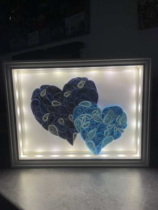 Cadre duo cœur bleu lumineux