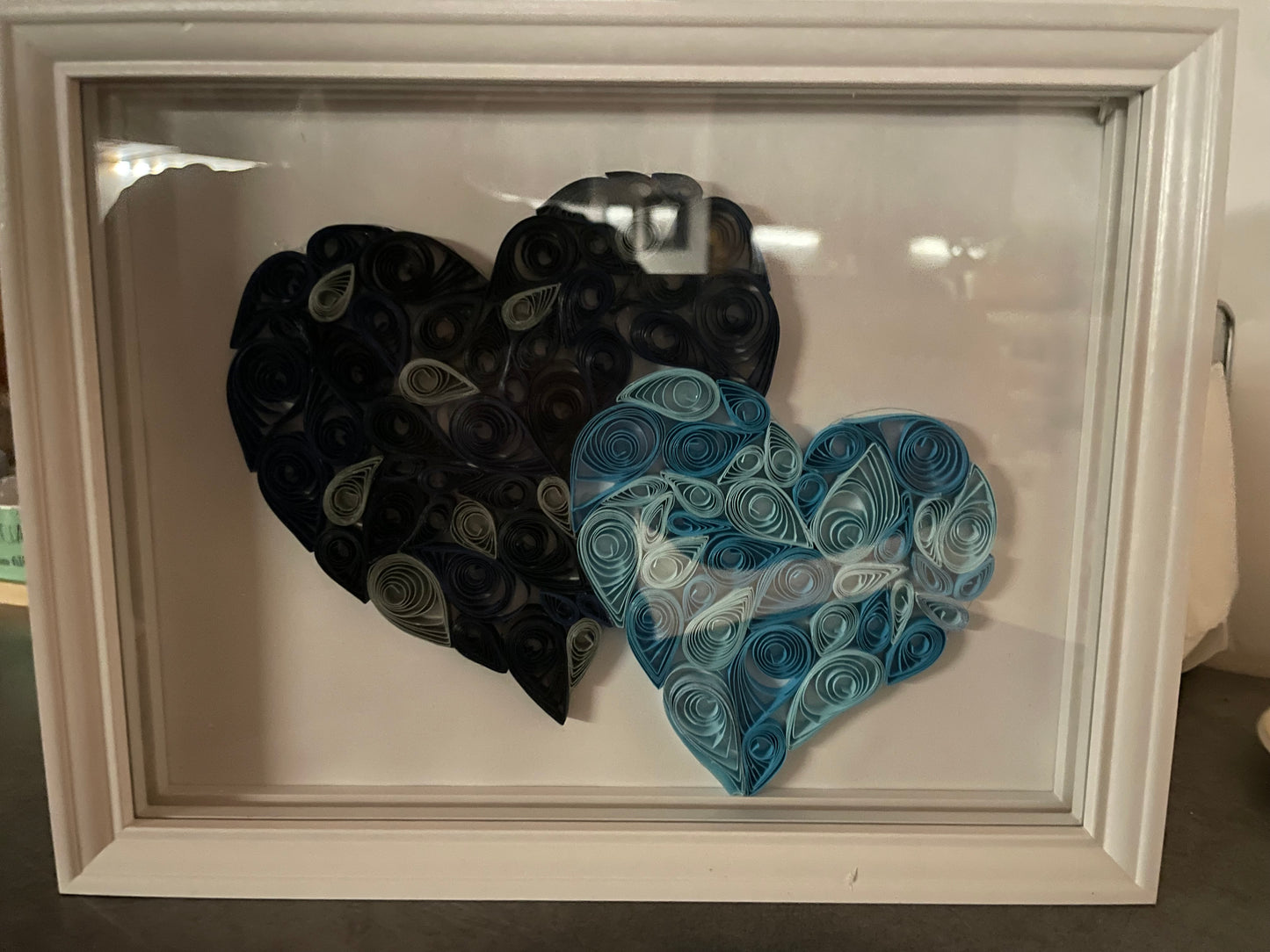 Cadre duo cœur bleu lumineux